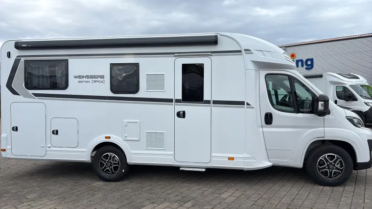 Seitlich Weinsberg CaraSuite 700 ME Sofort verfügbar Modell 27