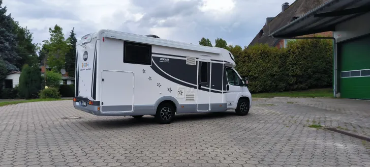 Fahrzeugbild Miller States Montana 165 PS + Hubbett + Solar #6
